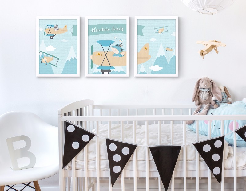 3-frames-airplane-blue-near-cot-with-plane-mobile